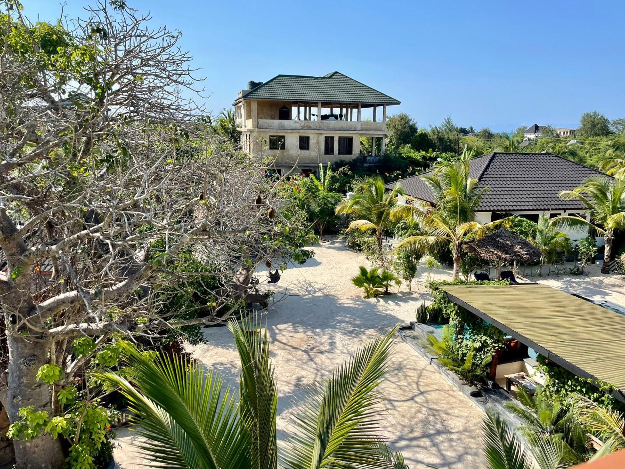 Baobab Bungalows Джамбиани Экстерьер фото
